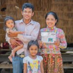 Cambodian officials launch a poverty support program providing cash assistance to low-income families in selected districts.