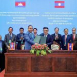 Cambodia Laos bilateral cooperation meeting with Stung Treng governor and Lao officials discussing cross-border development