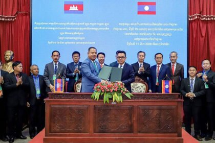 Cambodia Laos bilateral cooperation meeting with Stung Treng governor and Lao officials discussing cross-border development