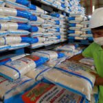 Cambodian rice bags stacked for export shipment as the country records an 83 percent increase in rice exports in early 2026.