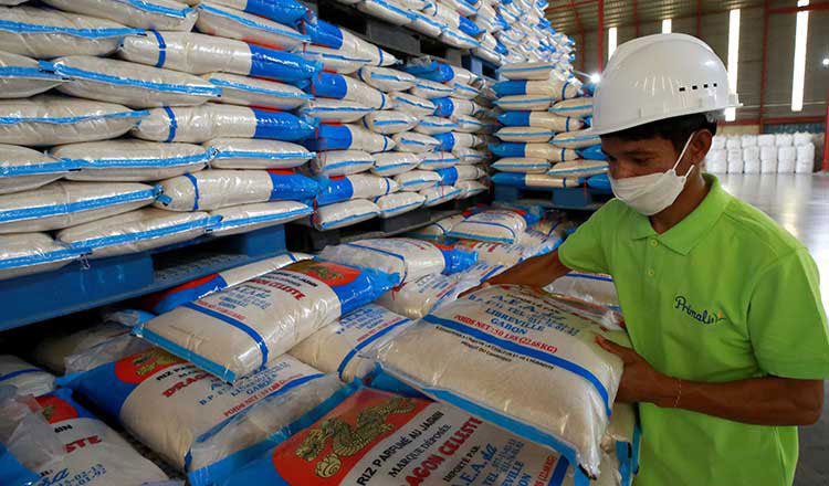 Cambodian rice bags stacked for export shipment as the country records an 83 percent increase in rice exports in early 2026.