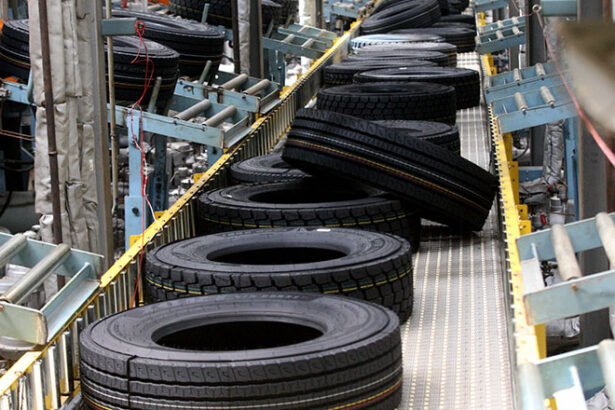 Rubber plantation workers harvesting latex as Cambodia rubber exports increase