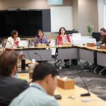 Cambodia minister speaking about investing in women and girls for national development and gender equality