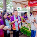 Tourists enjoying traditional Khmer food and cooking demonstrations at Battambang food festival