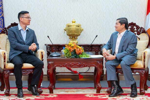 Cambodian trainees learning electric vehicle repair and maintenance skills