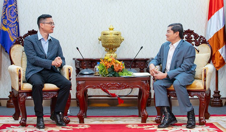 Cambodian trainees learning electric vehicle repair and maintenance skills