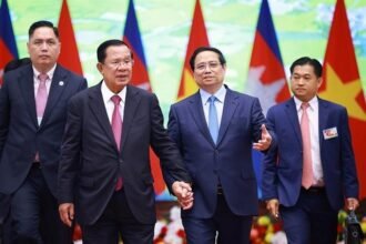 Cambodia Vietnam cooperation meeting showing leaders discussing trade, infrastructure, and regional partnership