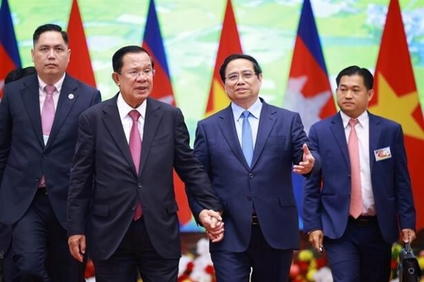Cambodia Vietnam cooperation meeting showing leaders discussing trade, infrastructure, and regional partnership