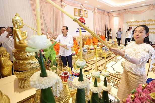 Khmer New Year blessing ceremony Cambodia with officials and monks performing traditional rituals
