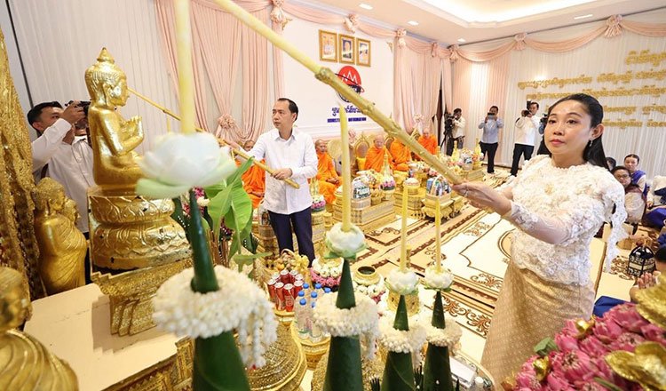 Khmer New Year blessing ceremony Cambodia with officials and monks performing traditional rituals