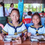 World Vision delivering aid to displaced families in Cambodia, supporting millions through humanitarian and development programmes.