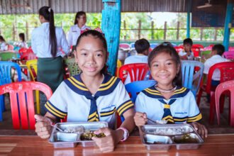 World Vision delivering aid to displaced families in Cambodia, supporting millions through humanitarian and development programmes.