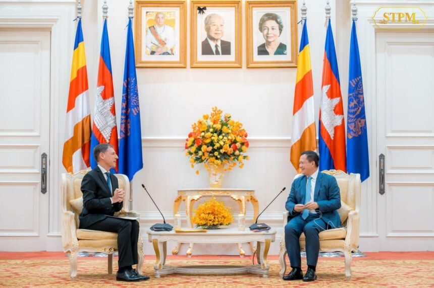 Cambodian Prime Minister Hun Manet holding talks with Dutch Ambassador Remco Johannes van Wijngaarden at the Peace Palace in Phnom Penh regarding Cambodia-Netherlands economic cooperation and investment relations.