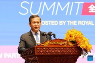 Cambodian Prime Minister Hun Manet delivering remarks at the General Department of Taxation headquarters inauguration in Phnom Penh.