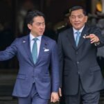 Indonesia and Japan defence ministers signing an agreement in Jakarta focusing on defence cooperation and regional security.